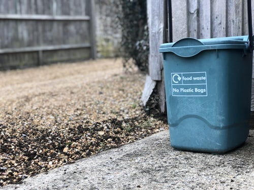 Recycling bin in a back garden